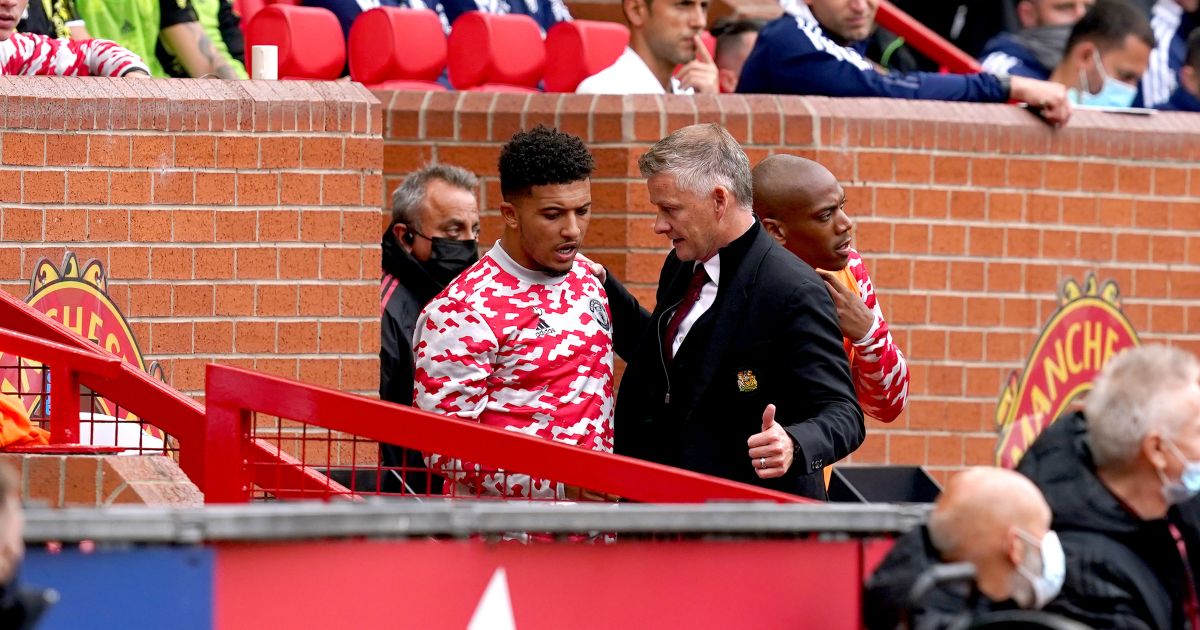 Man Utd boss Ole Gunnar Solskjaer talks to Jadon Sancho