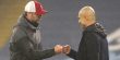 Jurgen Klopp fist bumps Pep Guardiola