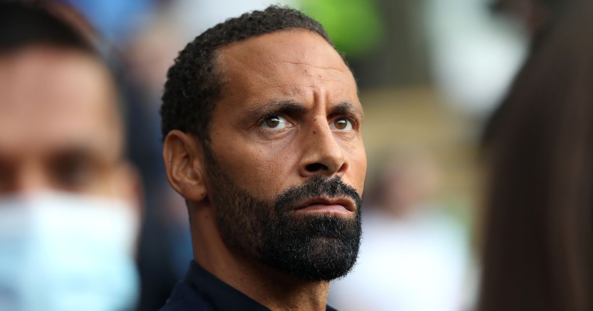 Rio Ferdinand watches a game of football
