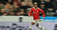 Man Utd forward Marcus Rashford runs with the ball