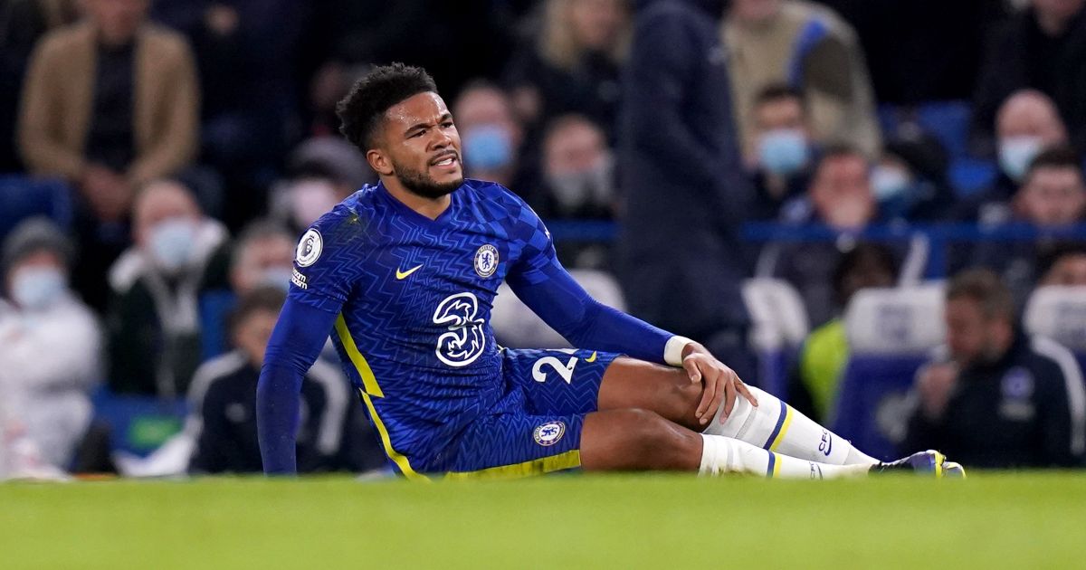 Chelsea defender Reece James holds his leg