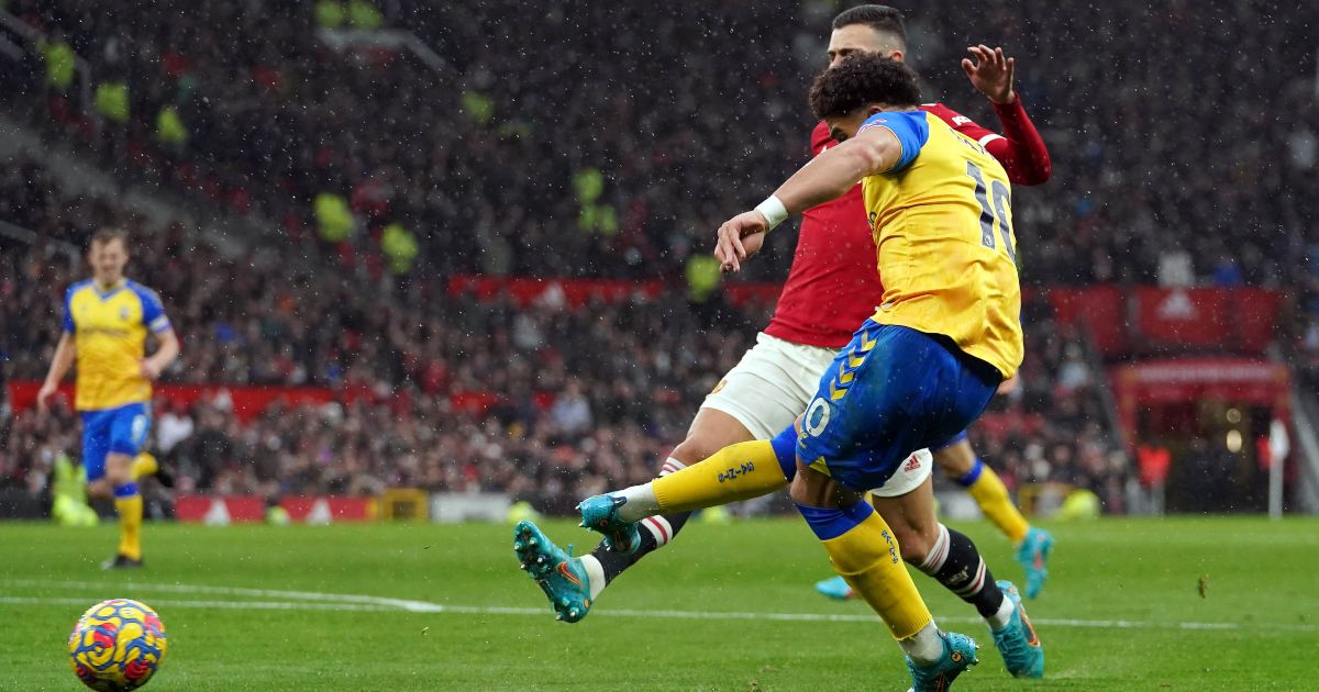 Che Adams scores a goal against Man Utd