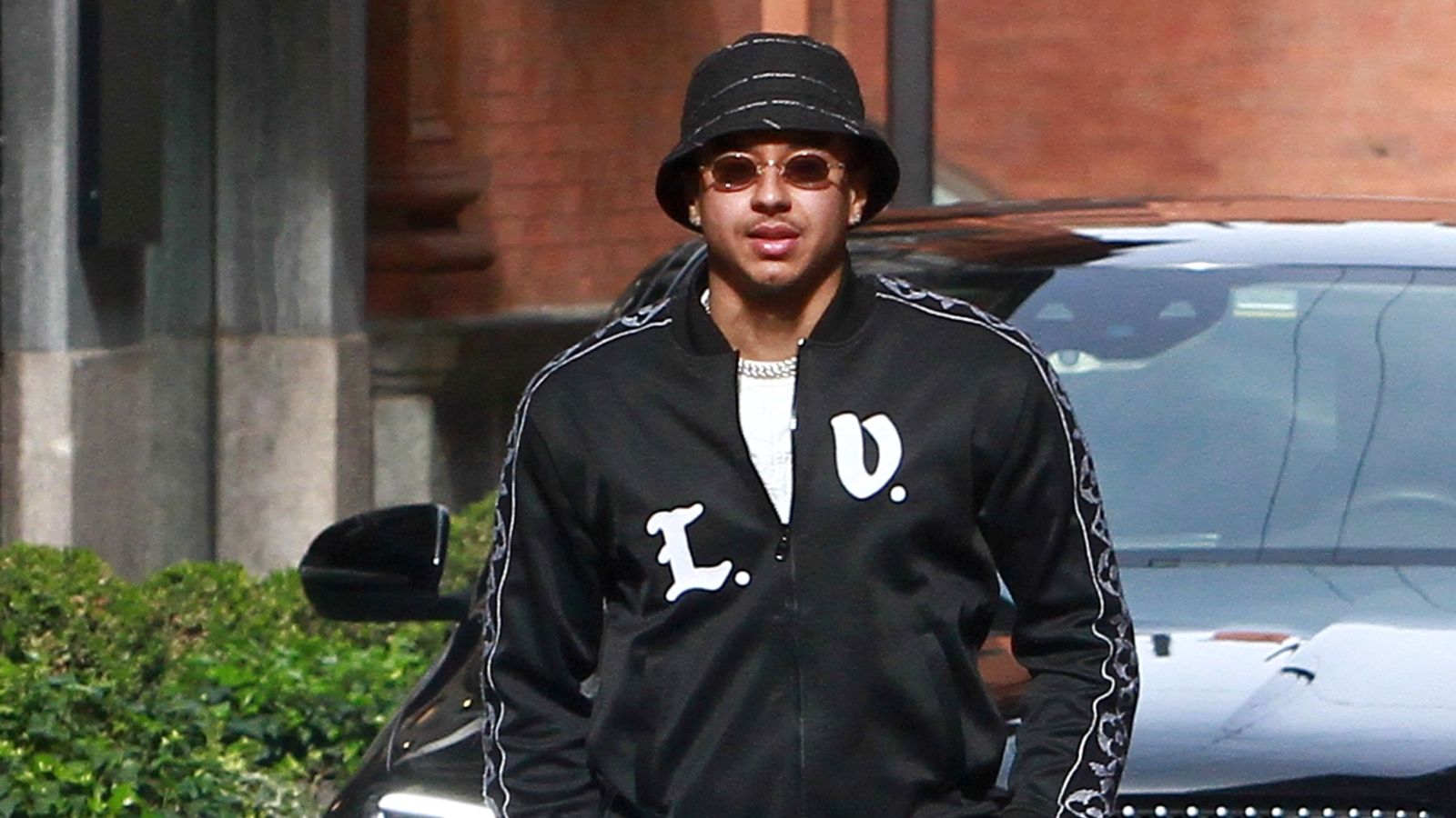 Man Utd winger Jesse Lingard walks around Milan