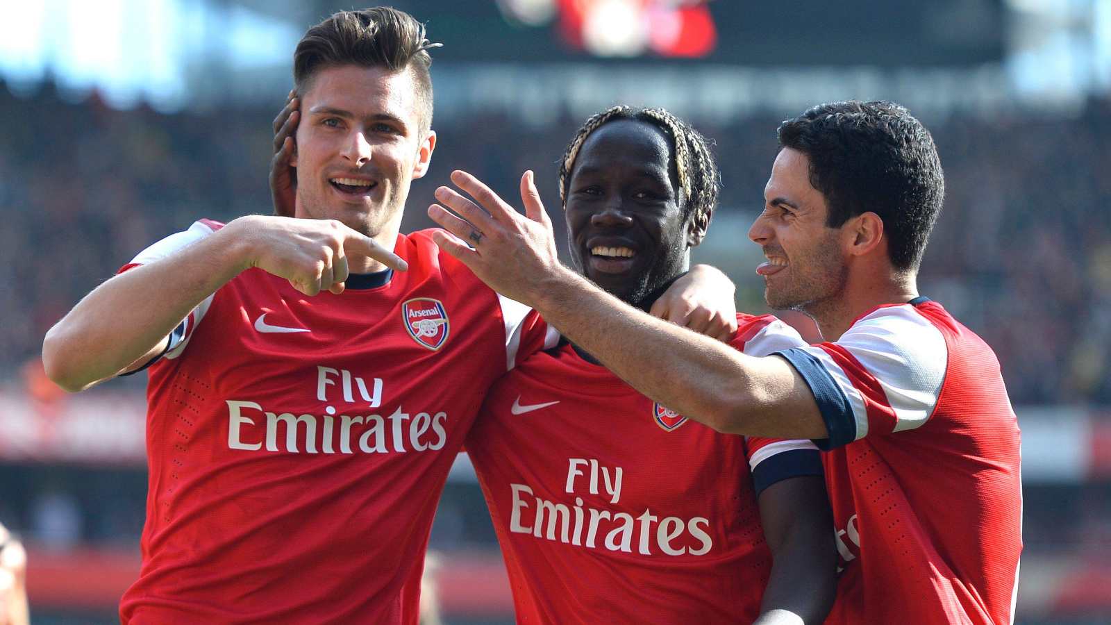 Mikel Arteta, Bacary Sagna and Olivier Giroud celebrate a goal