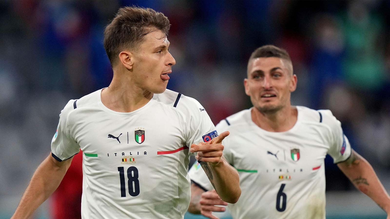 Italy's Nicolo Barella and Marco Verratti celebrate scoring