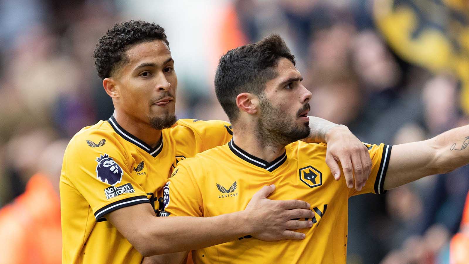 Pedro Neto of Wolves (R) celebrates