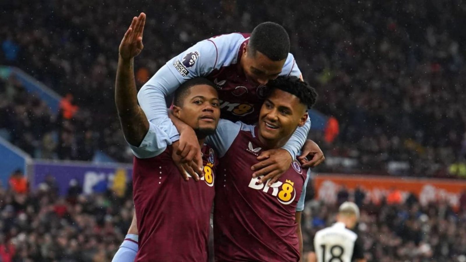 Aston Villa players celebrate their goal against Fulham.