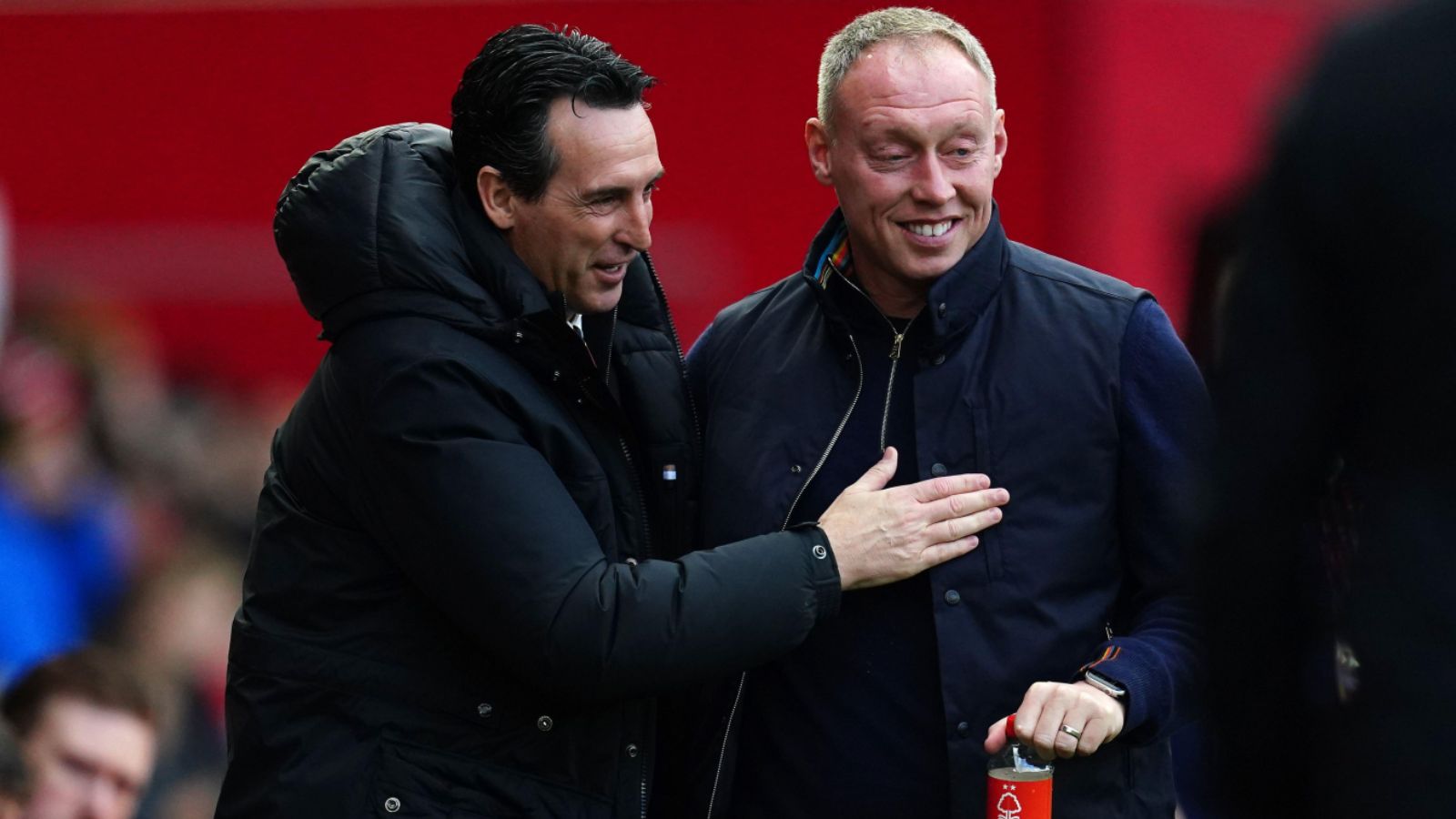 Nottingham Forest boss Steve Cooper greets Unai Emery before a match.