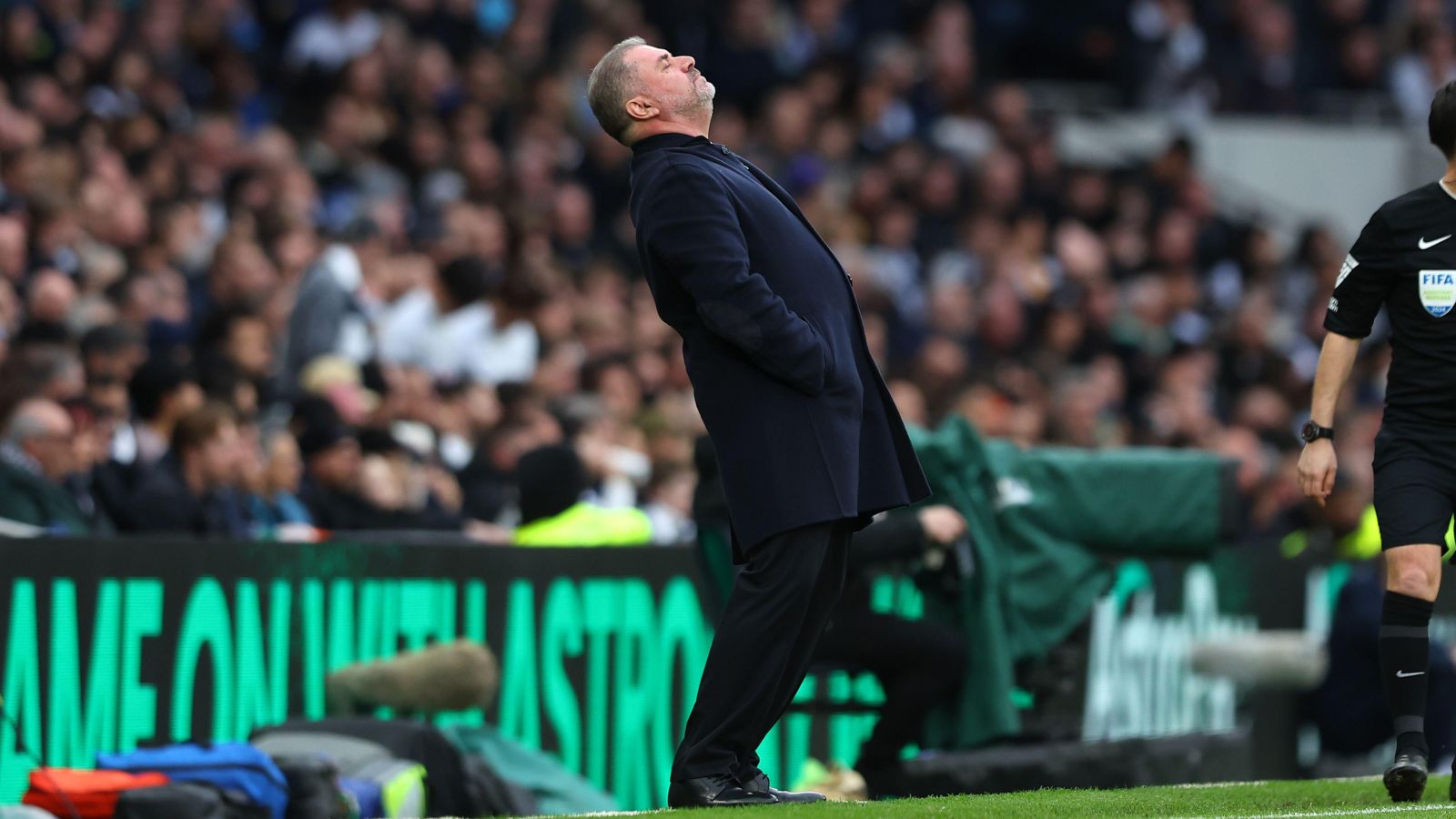 Ange Postecoglou looks frustrated during a match.