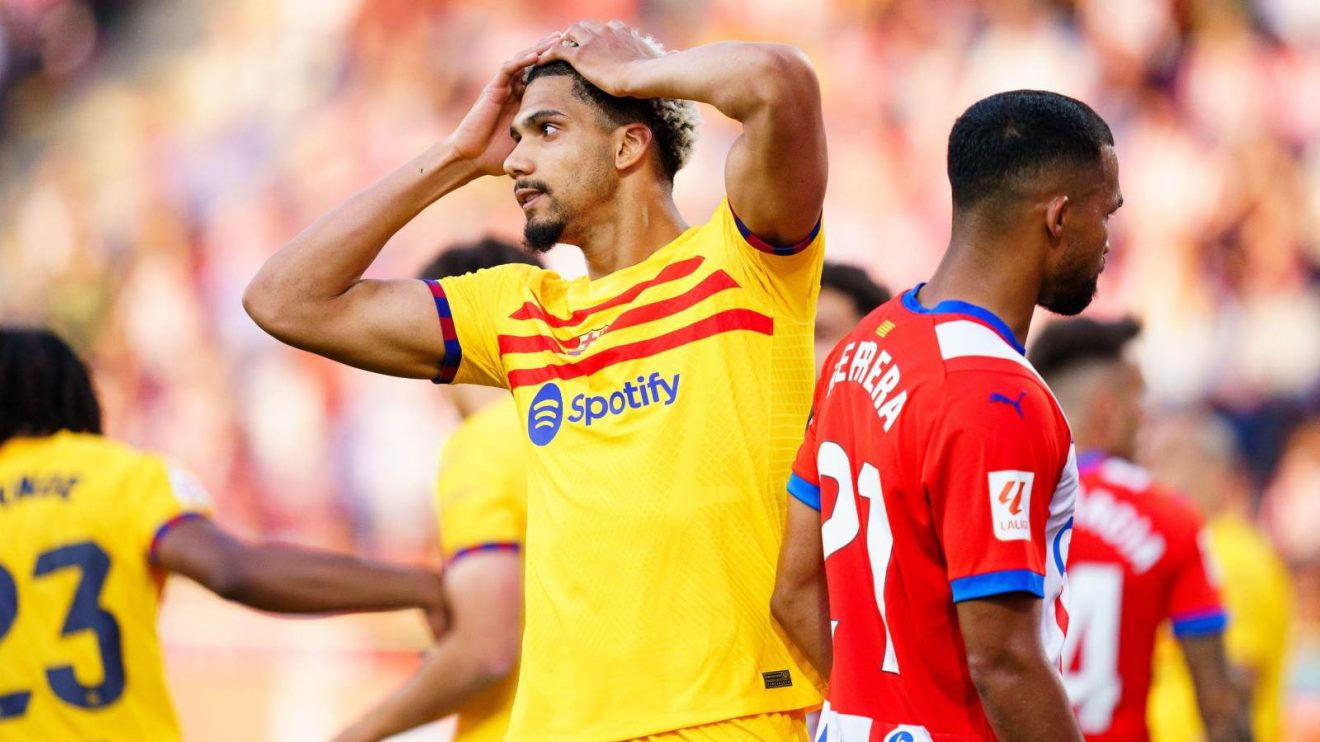 Barcelona defender Ronald Araujo looks dejected during a match