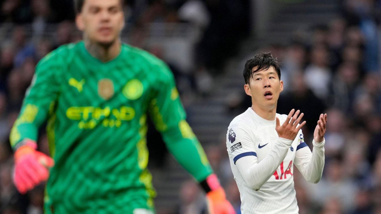 Tottenham captain Heung-min Son and Manchester City goalkeeper Ederson during a match