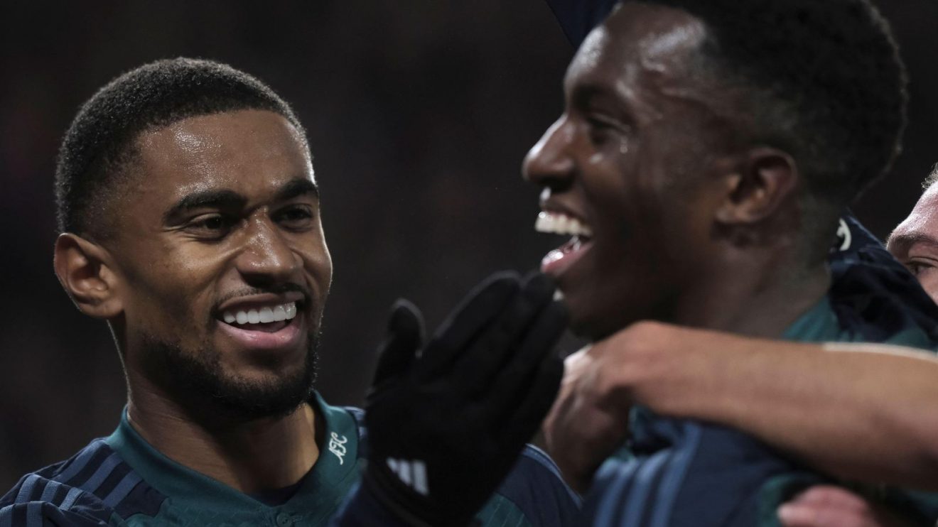 Arsenal forwards Reiss Nelson and Eddie Nketiah celebrate a goal together