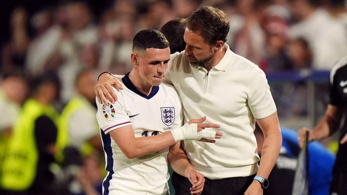 England manager Gareth Southgate consoles Phil Foden