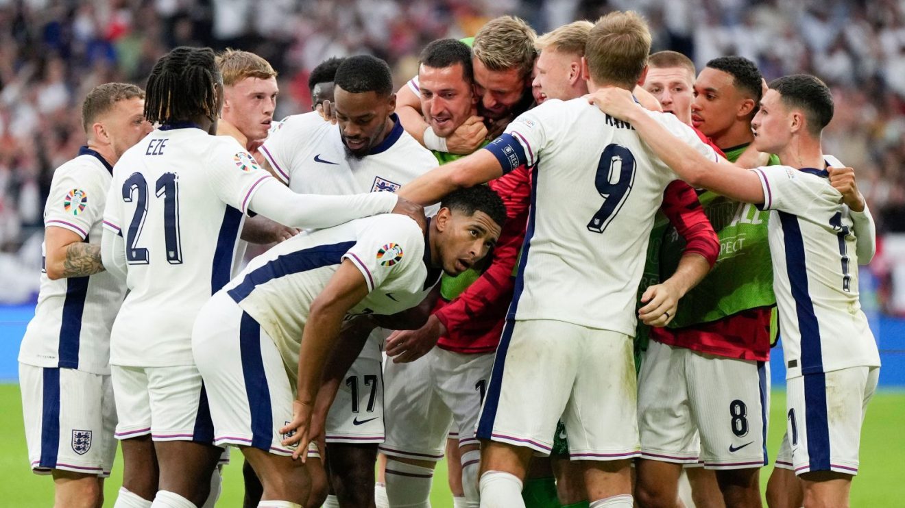 England players celebrate Jude Bellingham's goal against Slovakia at Euro 2024