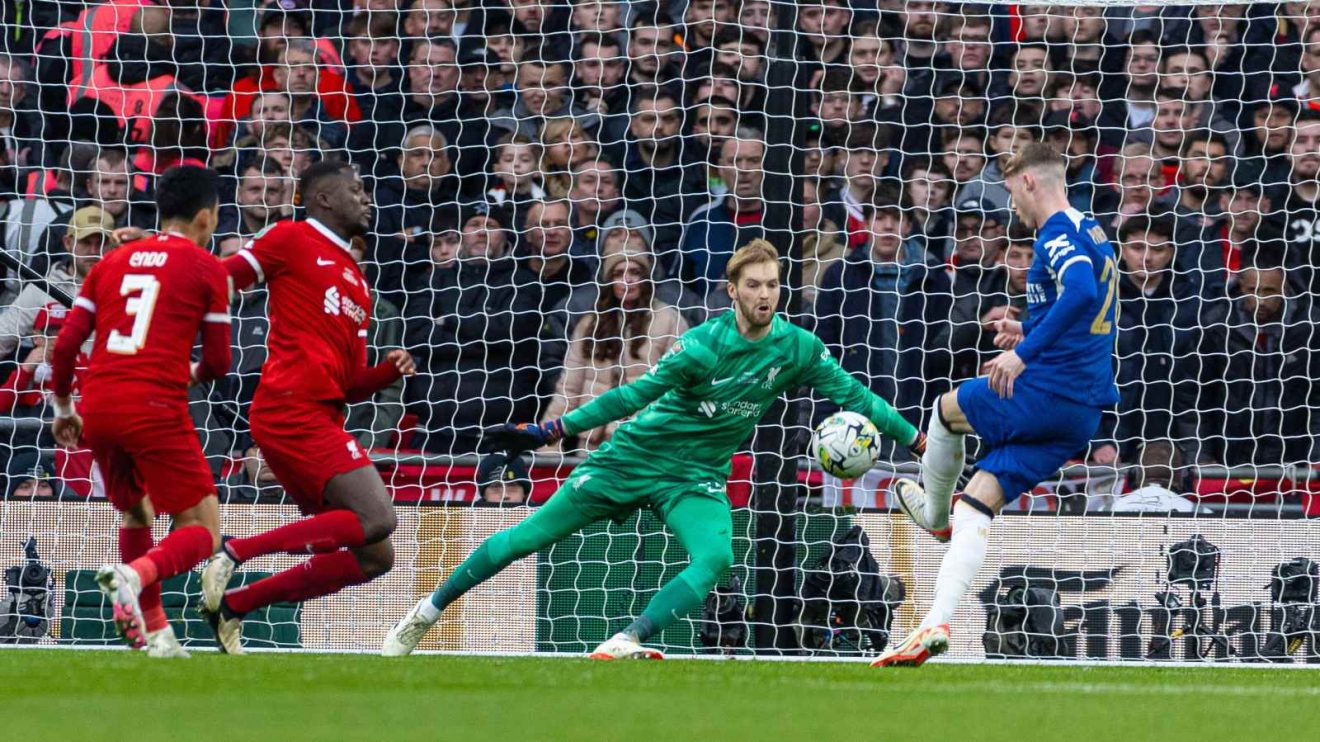 Liverpool goalkeeper Caoimhin Kelleher denies Cole Palmer in the Carabao Cup final