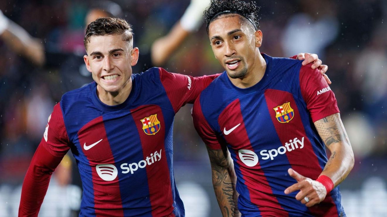 Chelsea-linked Barcelona duo Fermin Lopez and Raphinha celebrate a goal
