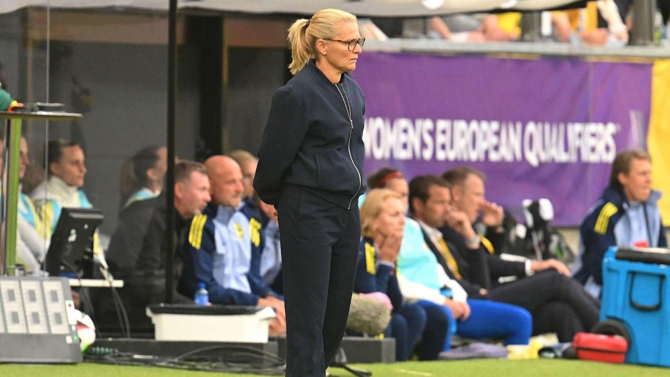 Sarina Wiegman watches on during a European Championship qualifier