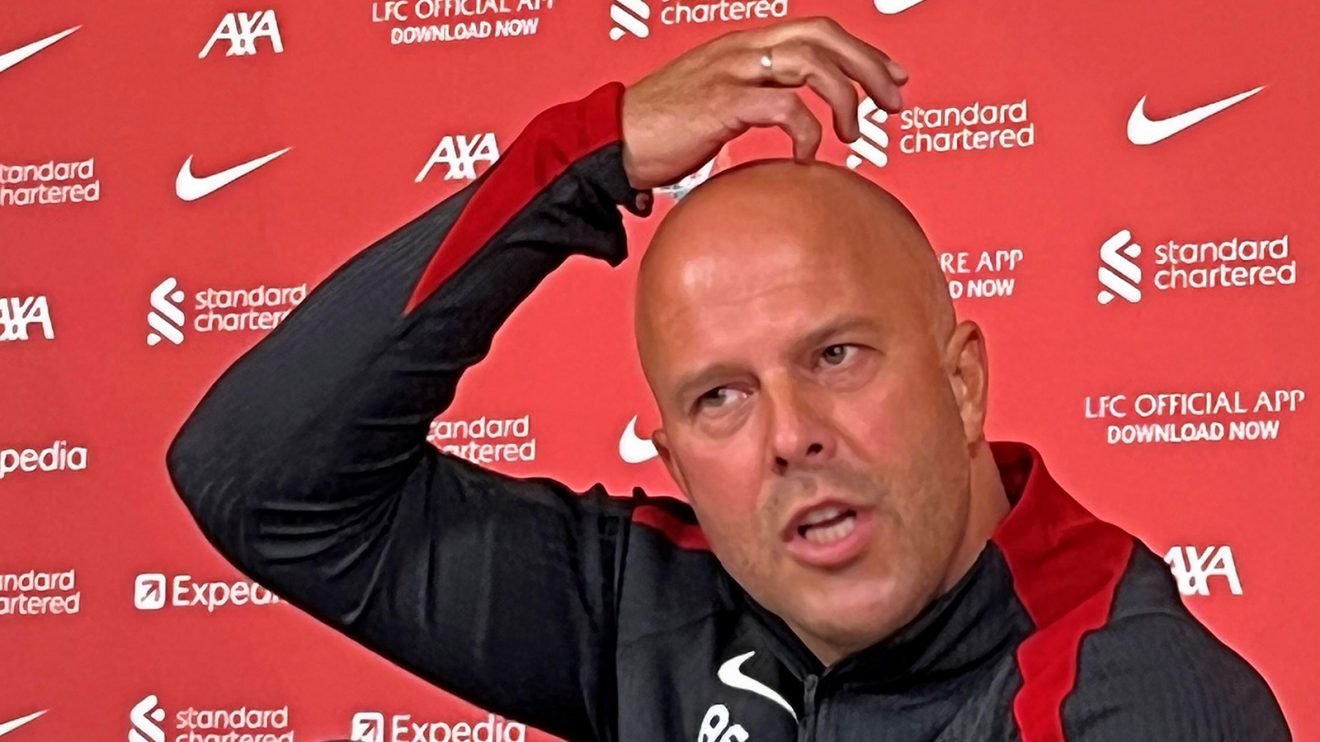 Arne Slot at his unveiling as Liverpool boss. He is scratching his head in quizzical fashion.