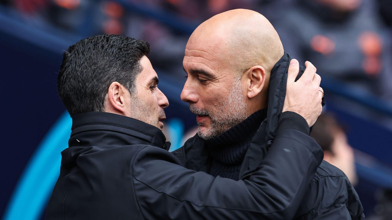 Mikel Arteta and Pep Guardiola share a tight embrace