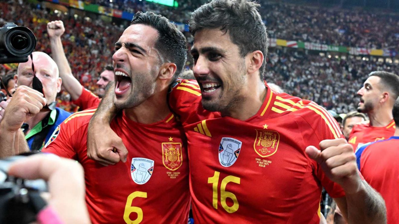 Arsenal-linked midfielder Mikel Merino and Rodri celebrate winning Euro 2024