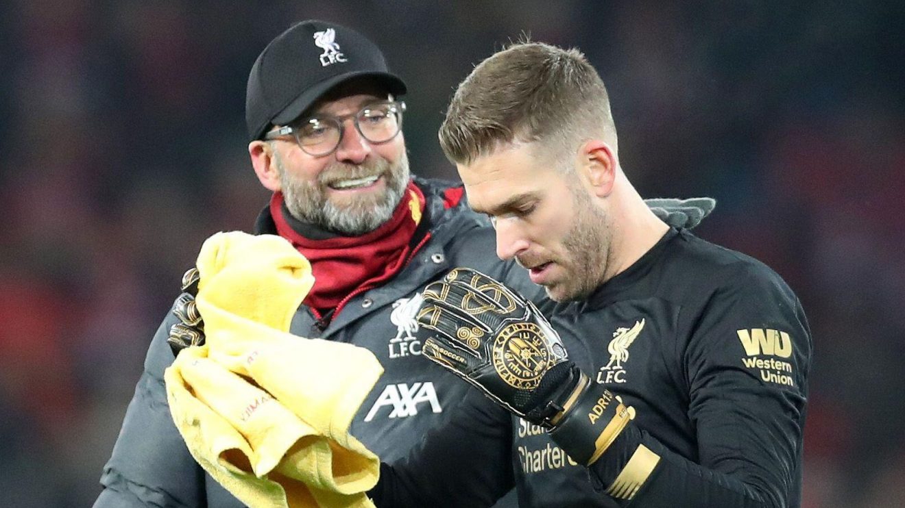 Liverpool manager Jurgen Klopp celebrates with goalkeeper Adrian
