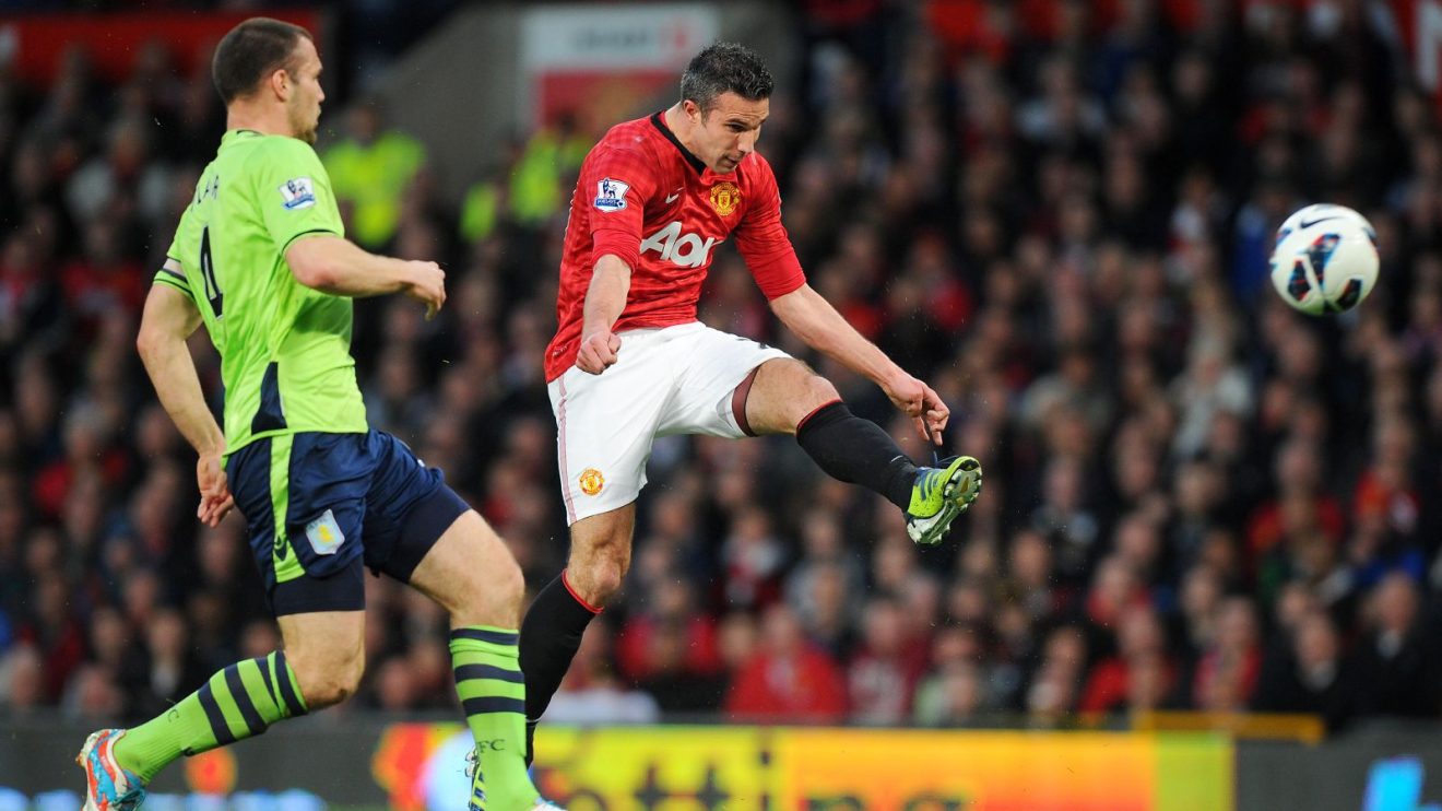 Manchester United striker Robin van Persie scores against Aston Villa
