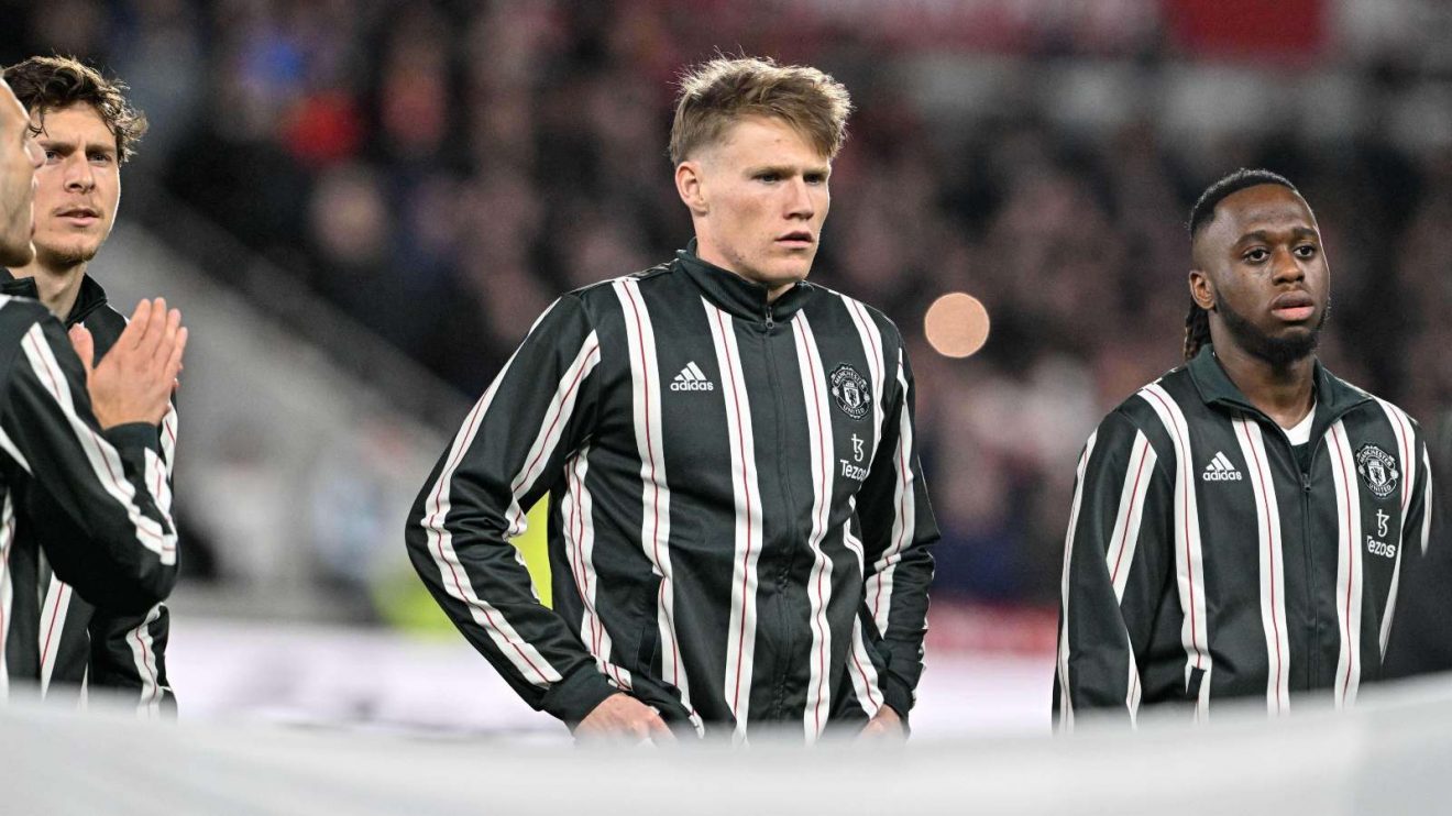 Man Utd midfielder Scott McTominay lines up before a match