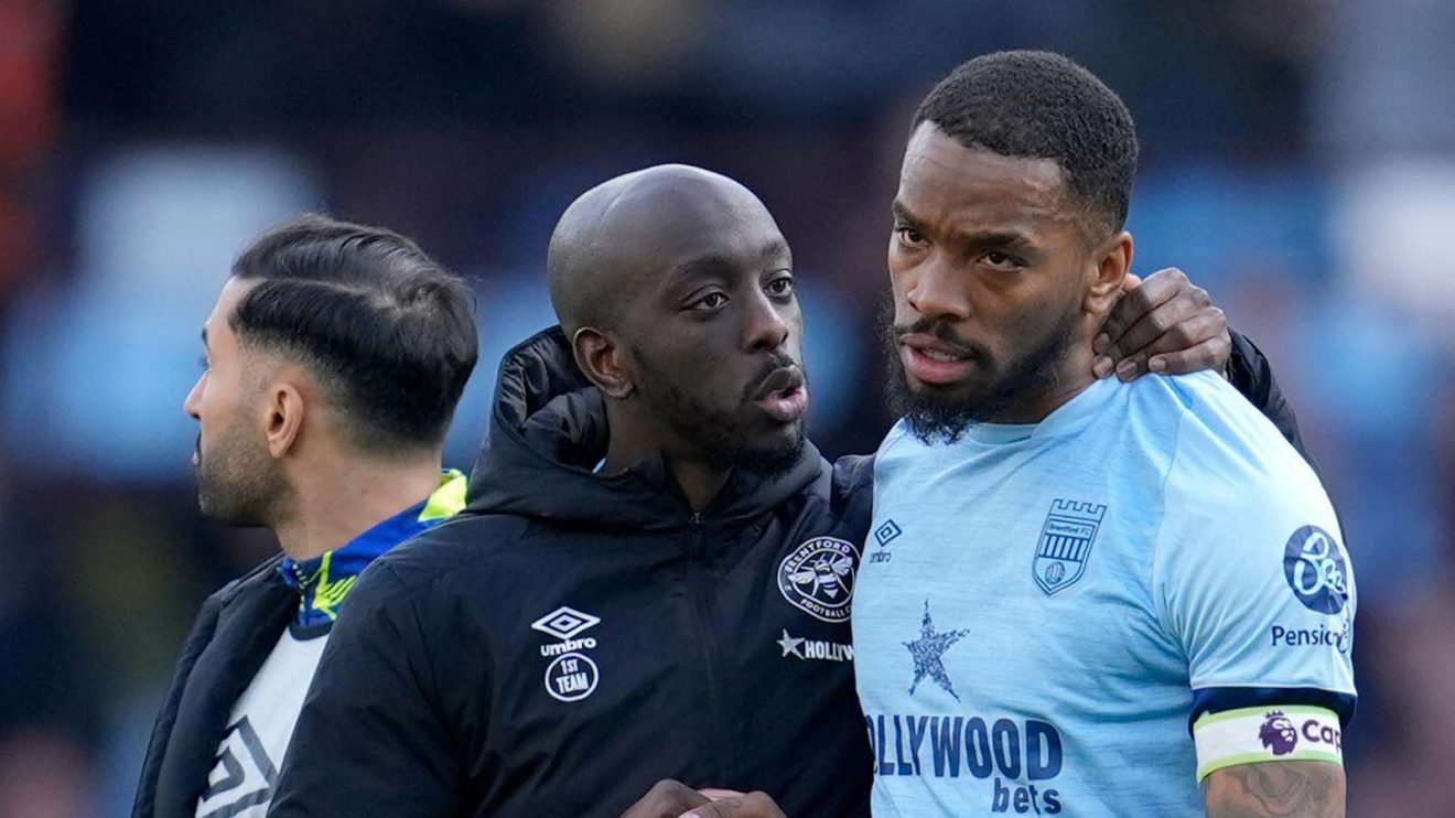 Brentford's Yoane Wissa (left) speaks with Ivan Toney