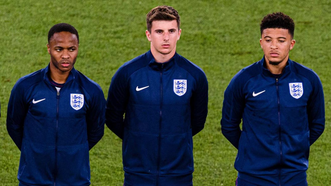Raheem Sterling, Mason Mount and Jadon Sancho line up before a match