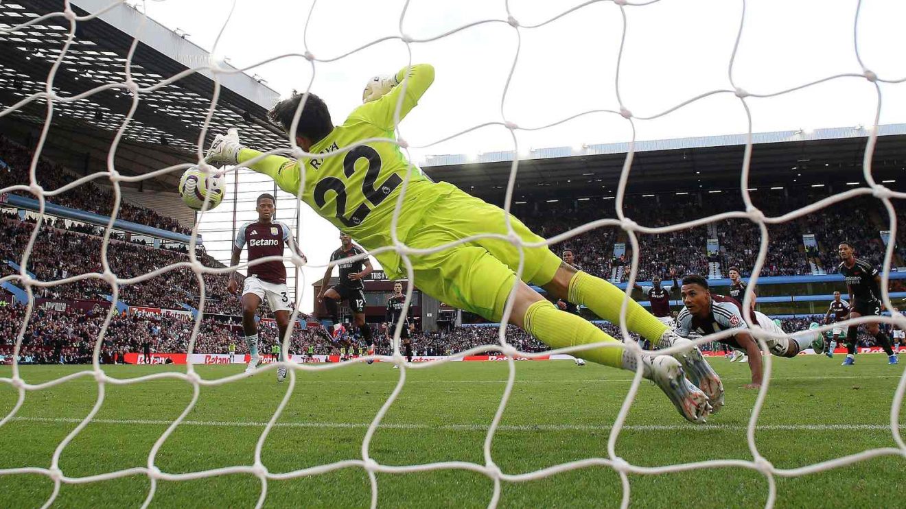 Arsenal goalkeeper David Raya makes a save to deny Ollie Watkins