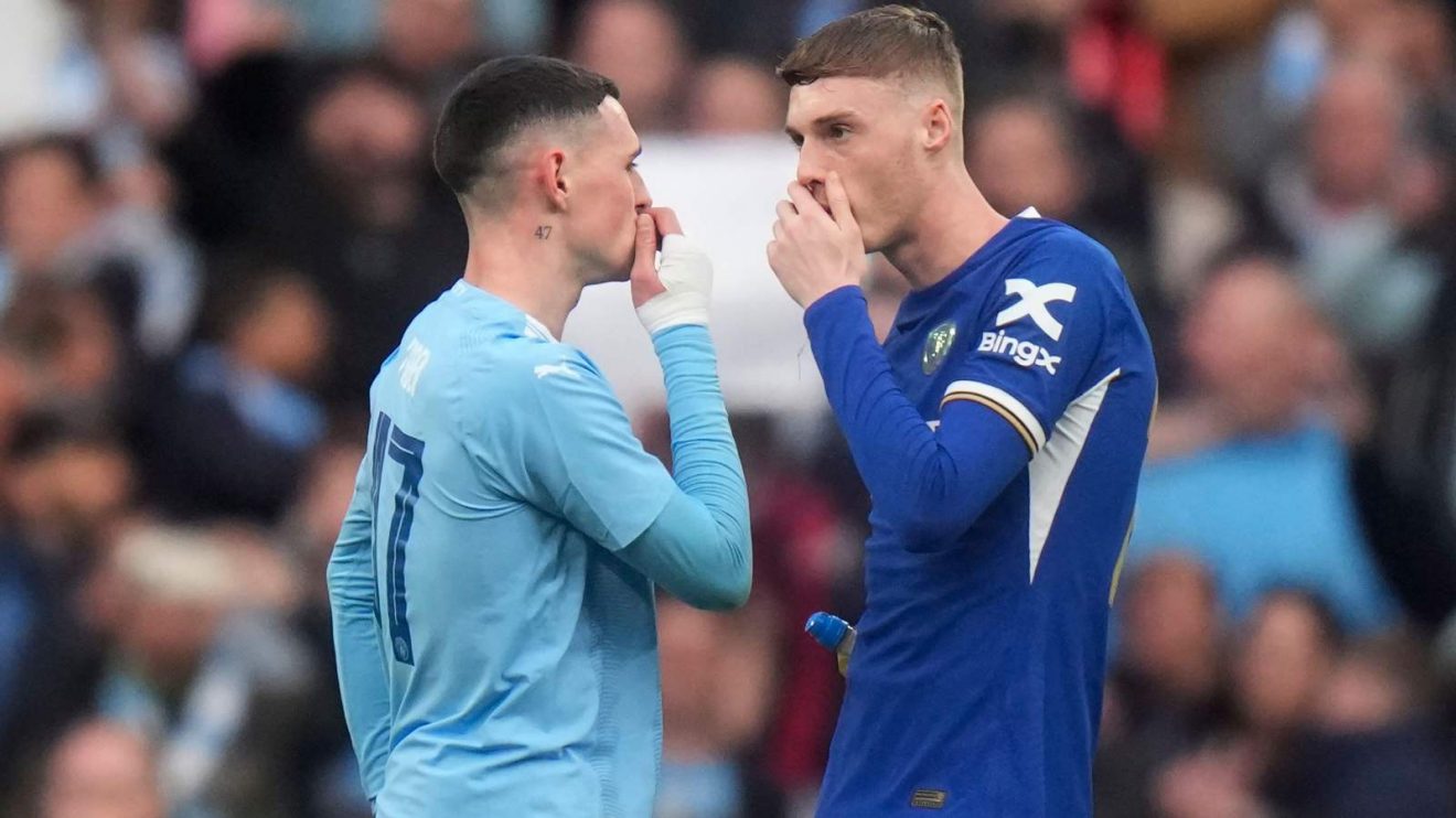 England players Phil Foden and Cole Palmer have a secretive chat after a match