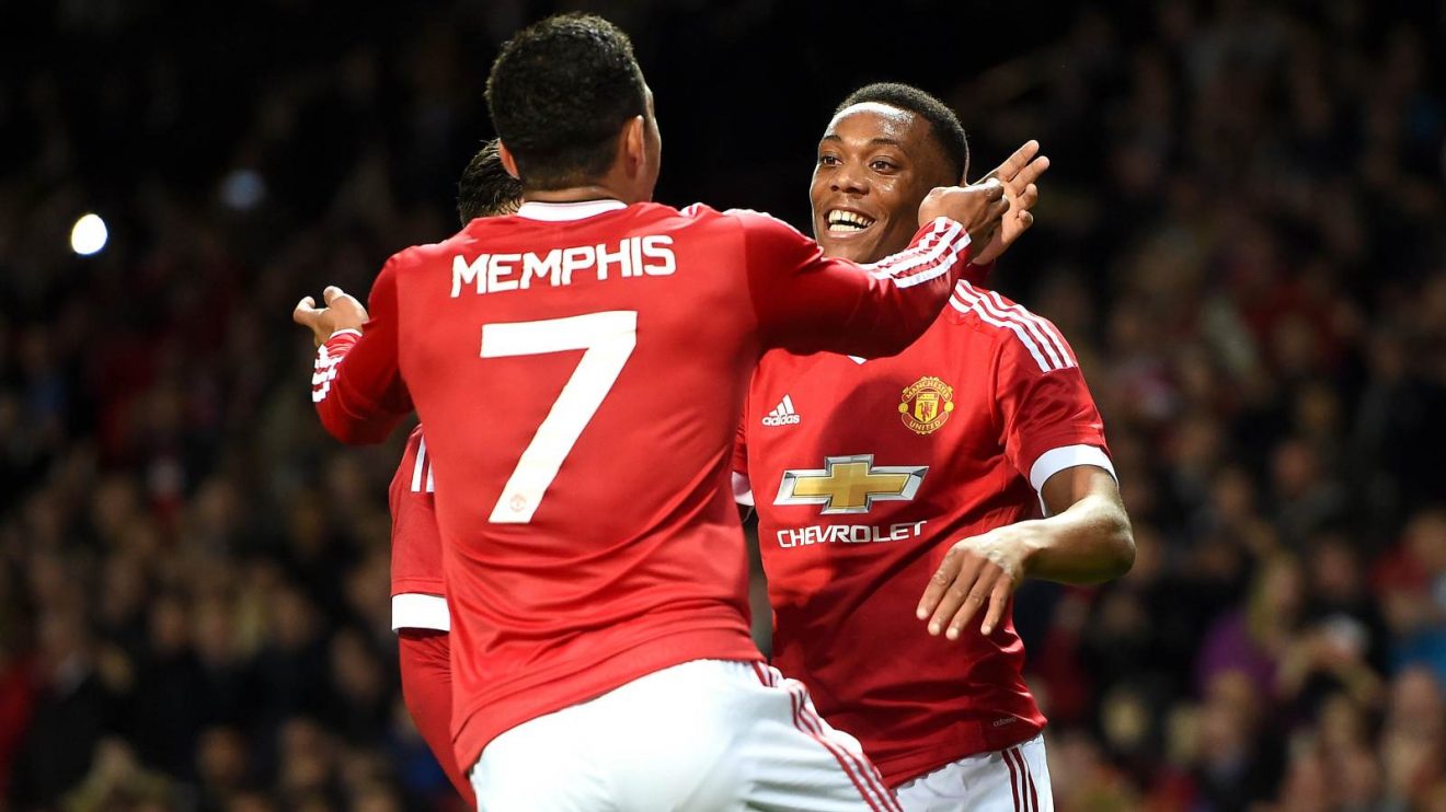 Man Utd forwards Anthony Martial Memphis Depay celebrate a goal