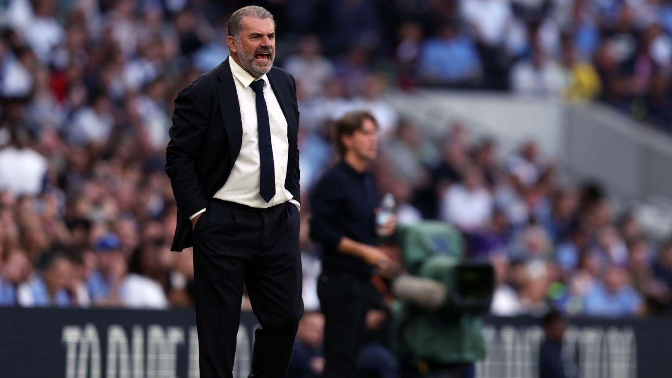 Tottenham head coach Ange Postecoglou shouts at his team during a match