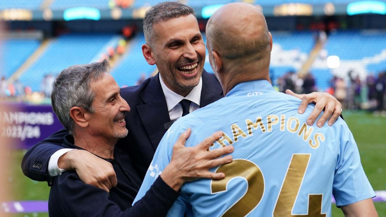 Man City owner and manager Khaldoon Al Mubarak and Pep Guardiola celebrate winning the Premier League