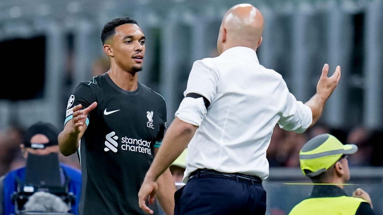 Liverpool right-back Trent Alexander-Arnold shakes hands with Arne Slot