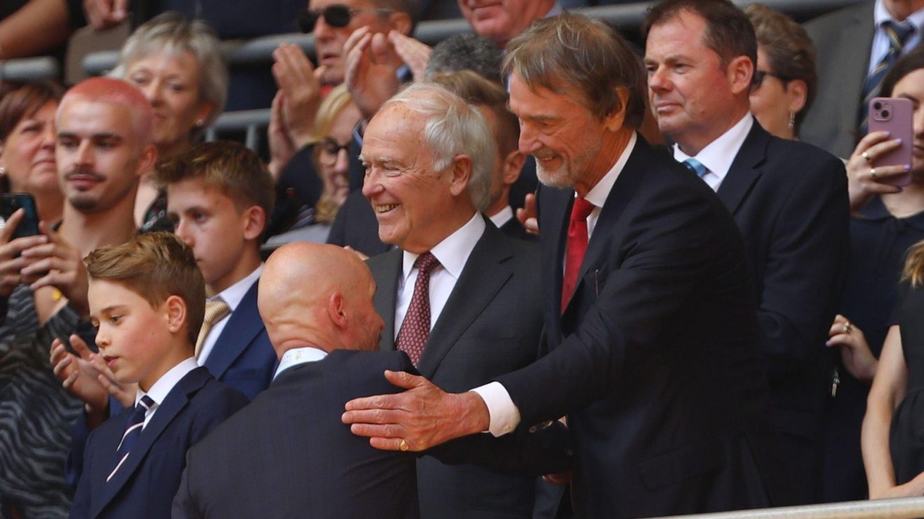 Manchester United coach Erik ten Hag embraces part-owner Sir Jim Ratcliffe