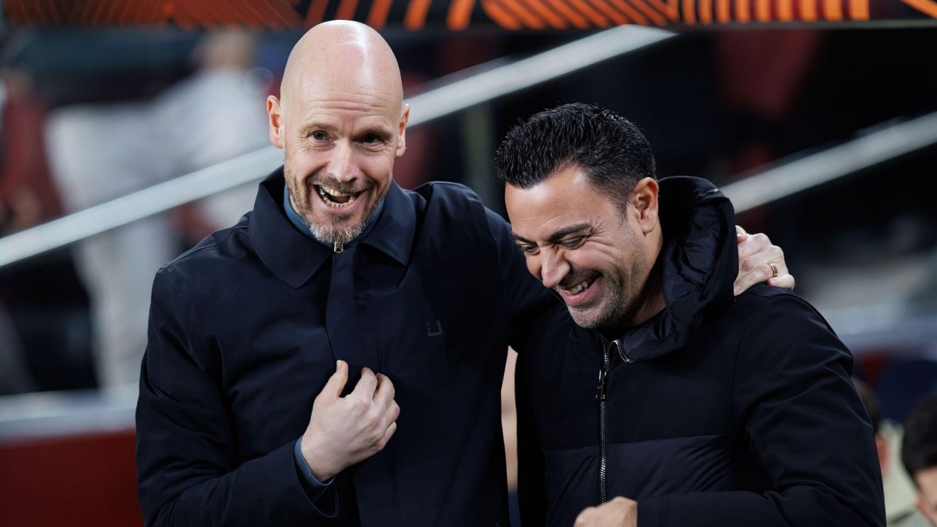 Manchester United head coach Erik ten Hag and Barcelona manager Xavi laugh