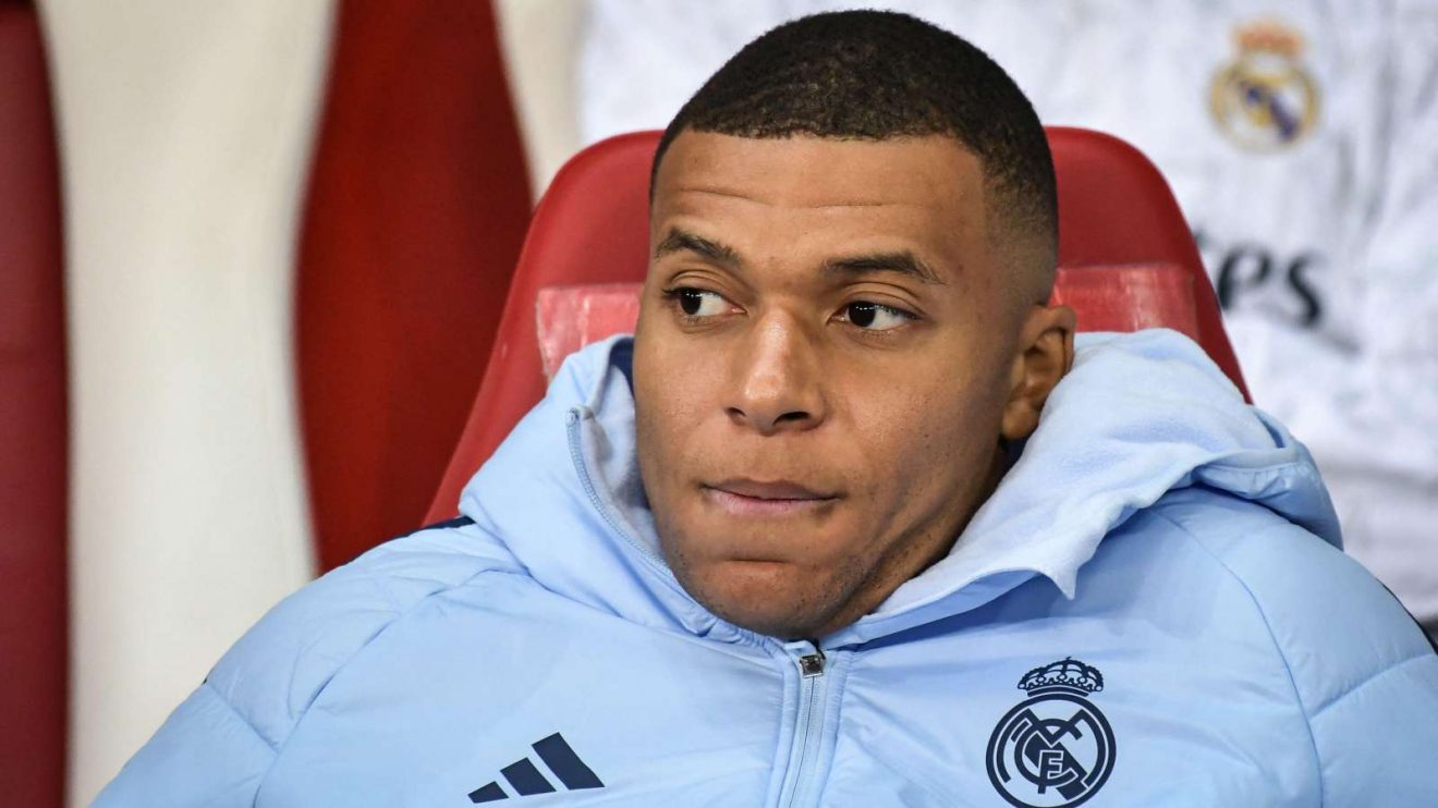 Kylian Mbappe sitting on the bench