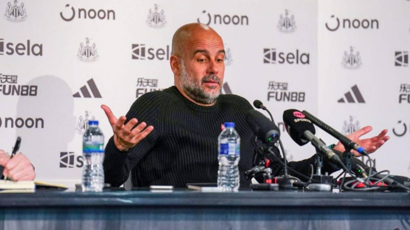 Man City manager Pep Guardiola gestures during a press conference