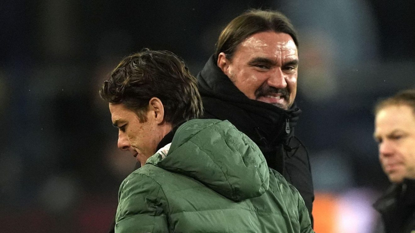 Burnley coach Scott Parker embraces Leeds manager Daniel Farke
