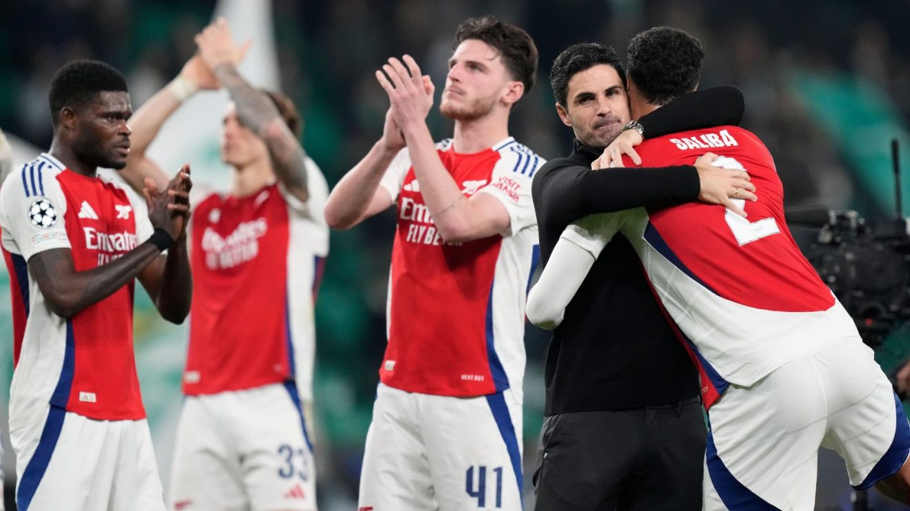 Arsenal players celebrate with Mikel Arteta