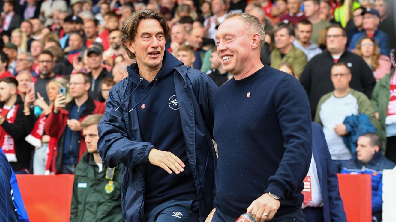 Thomas Frank greets Steve Cooper before a match