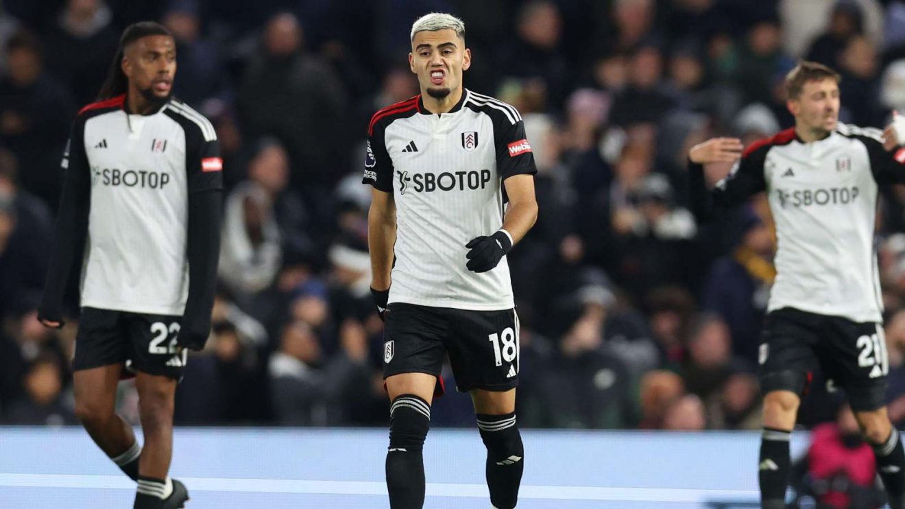 Fulham playmaker Andreas Pereira looks dejected after conceding a goal