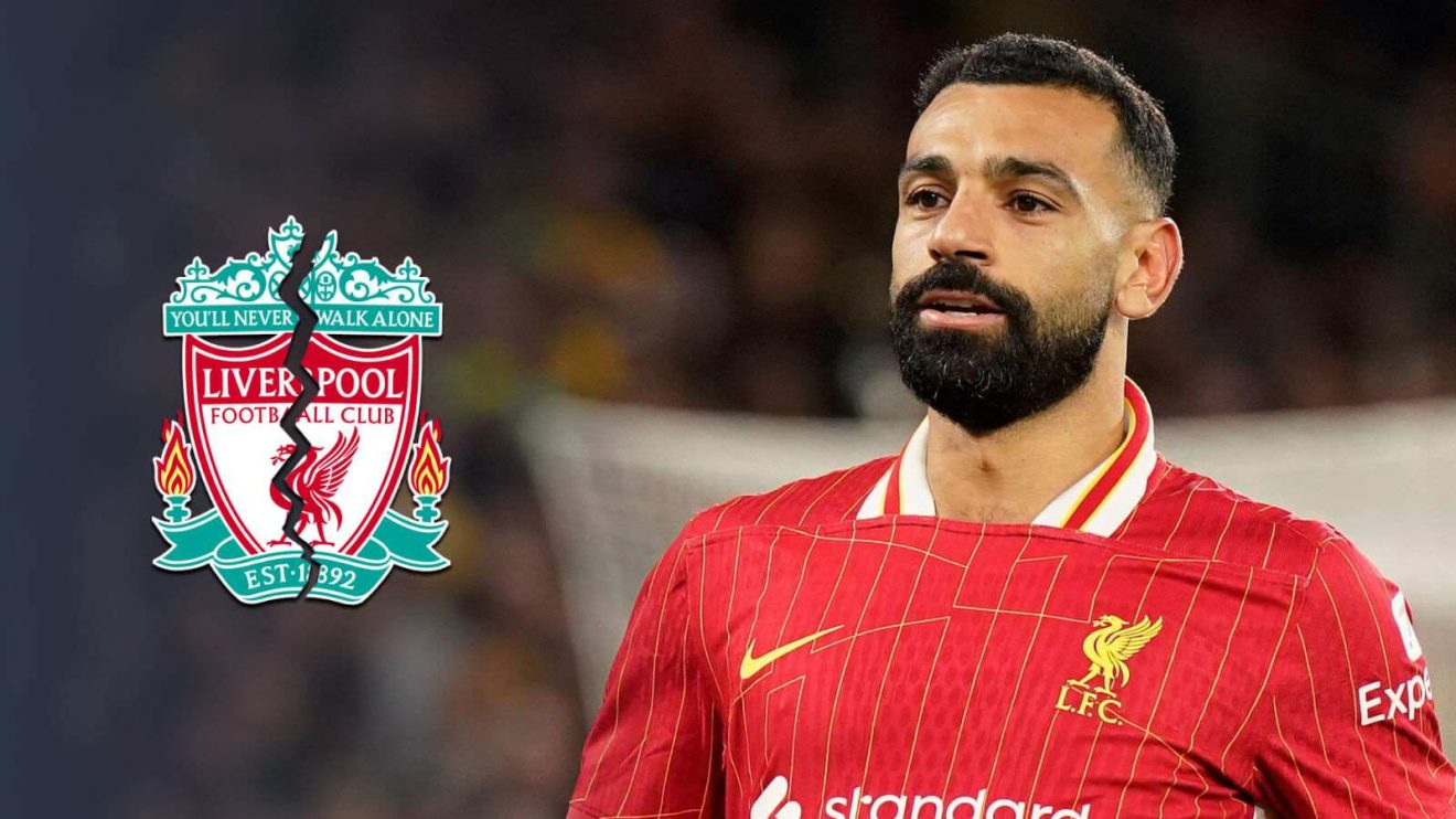Mohamed Salah with a cracked Liverpool badge