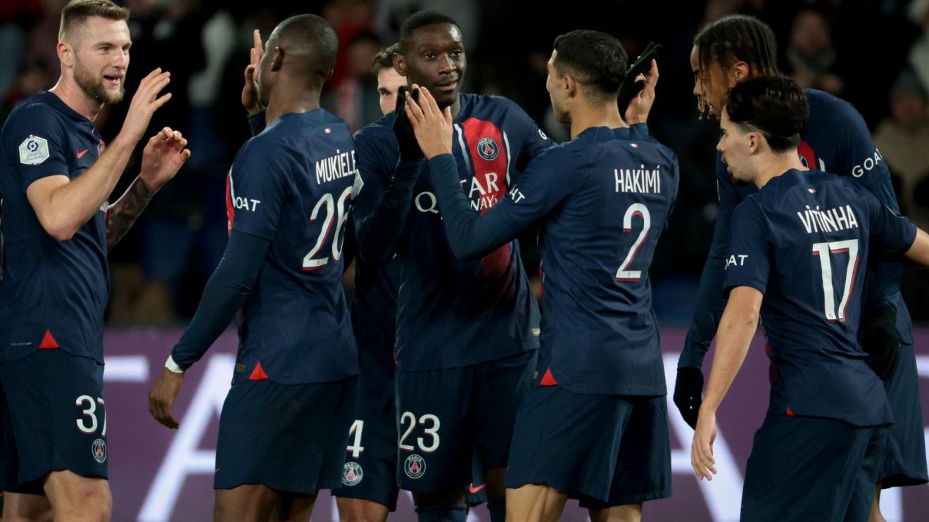 Liverpool target Randal Kolo Muani celebrates a goal with his teammates