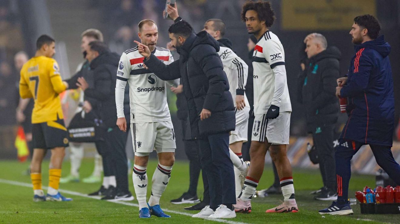 Man Utd head coach Ruben Amorim gives instructions to Christian Eriksen