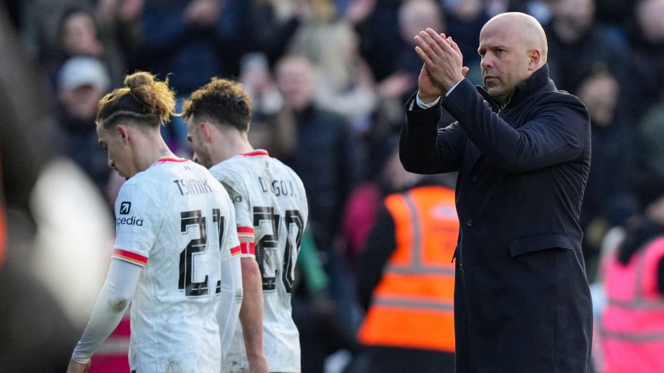 Arne Slot applauds the fans after Liverpool were knocked out of the FA Cup by Plymouth