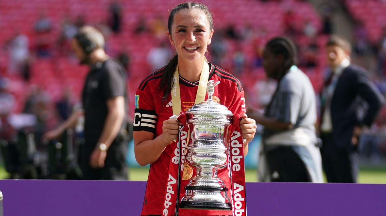 Man Utd captain Katie Zelem celebrates winning the FA Cup