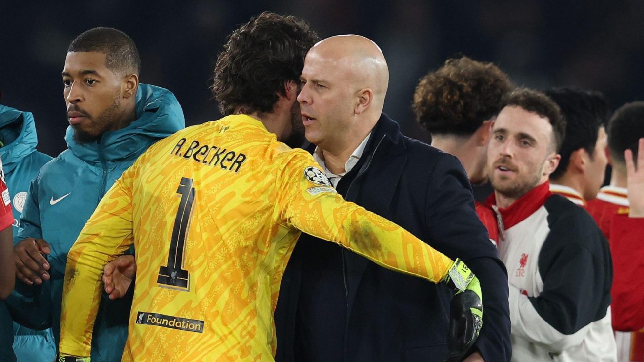 Arne Slot and Alisson celebrate