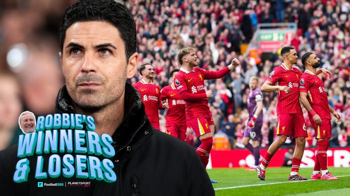 MIkel Arteta looks pensive while Liverpool celebrate.